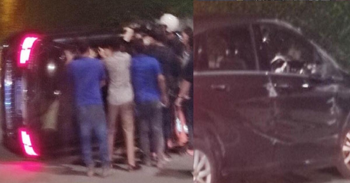 DRIVER TRAPPED AFTER CAR FLIPPED OVER ON ROAD, RESCUED BY PASSERS-BY