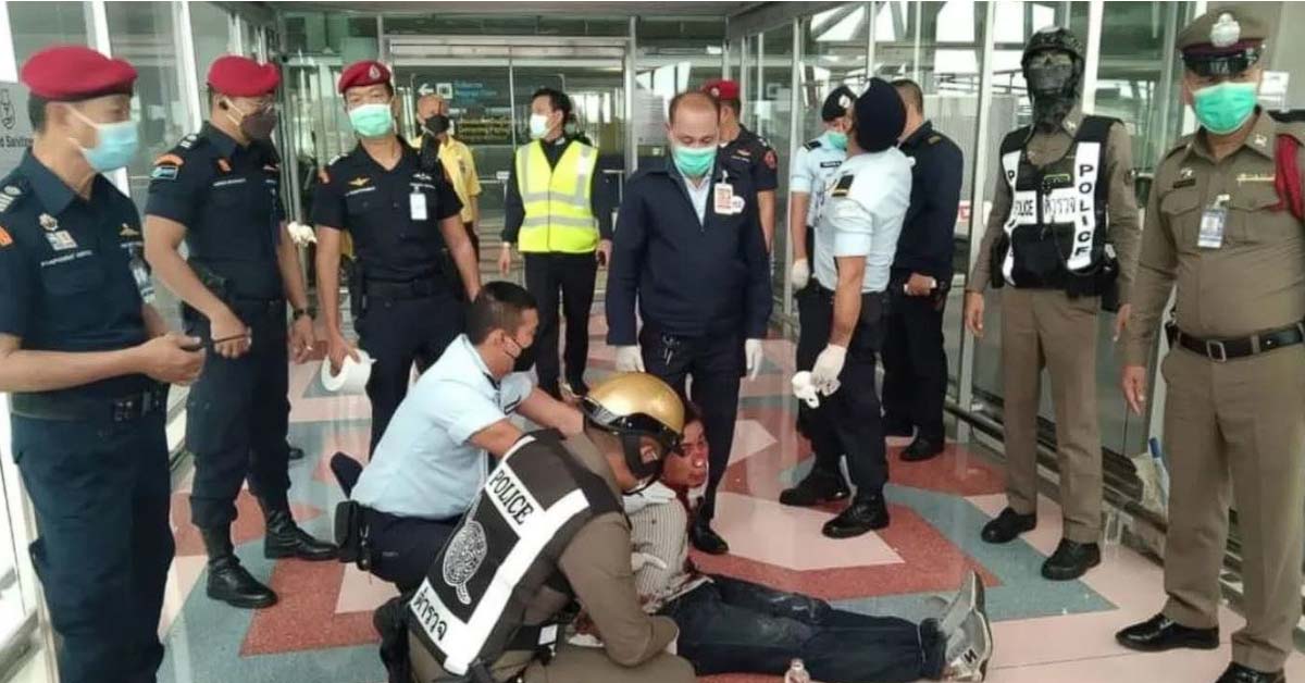 MAN WITH AXE & FAKE GUN GOES NUTS AT BANGKOK SUVARNABHUMI AIRPORT
