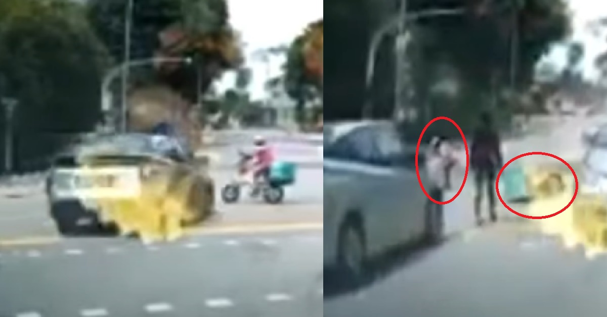 DELIVERY RIDER JAYWALKS ACROSS RED LIGHT, KNOCKED DOWN BY CAR