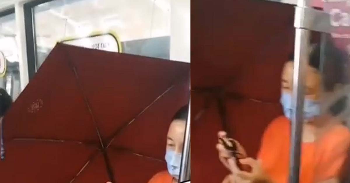 AUNTIE OPENS UP UMBRELLA IN MRT TO OCCUPY ALL THE SEATS SHE WANTS