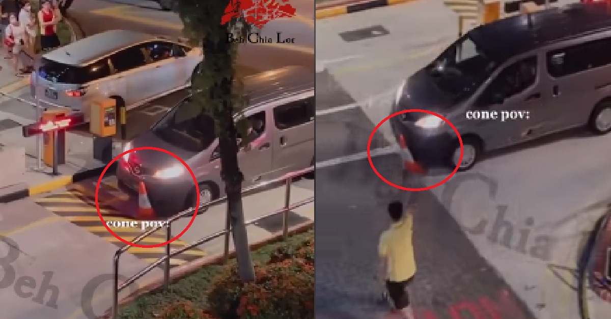 DRIVER INSISTS ON ENTERING CARPARK THAT IS FULL, RUNS OVER TRAFFIC CONE
