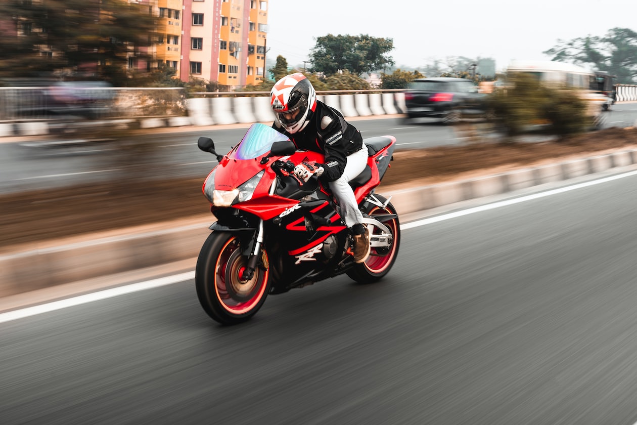 HUSBAND SCARES WIFE BY SPEEDING ON HIGHWAY TO SHOWOFF TO HIS MOTORCYCLE GROUP