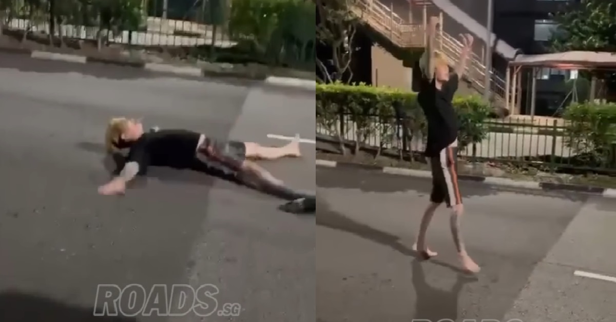 AH BENG LIES DOWN IN THE MIDDLE OF THE ROAD, DOES BACKFLIPS & ASKS CARS TO “LAI!”