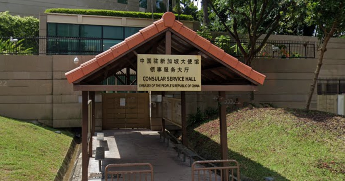 32 Y.O WOMAN PROTEST OUTSIDE EMBASSY OF CHINA IN SINGAPORE, FACING INVESTIGATIONS