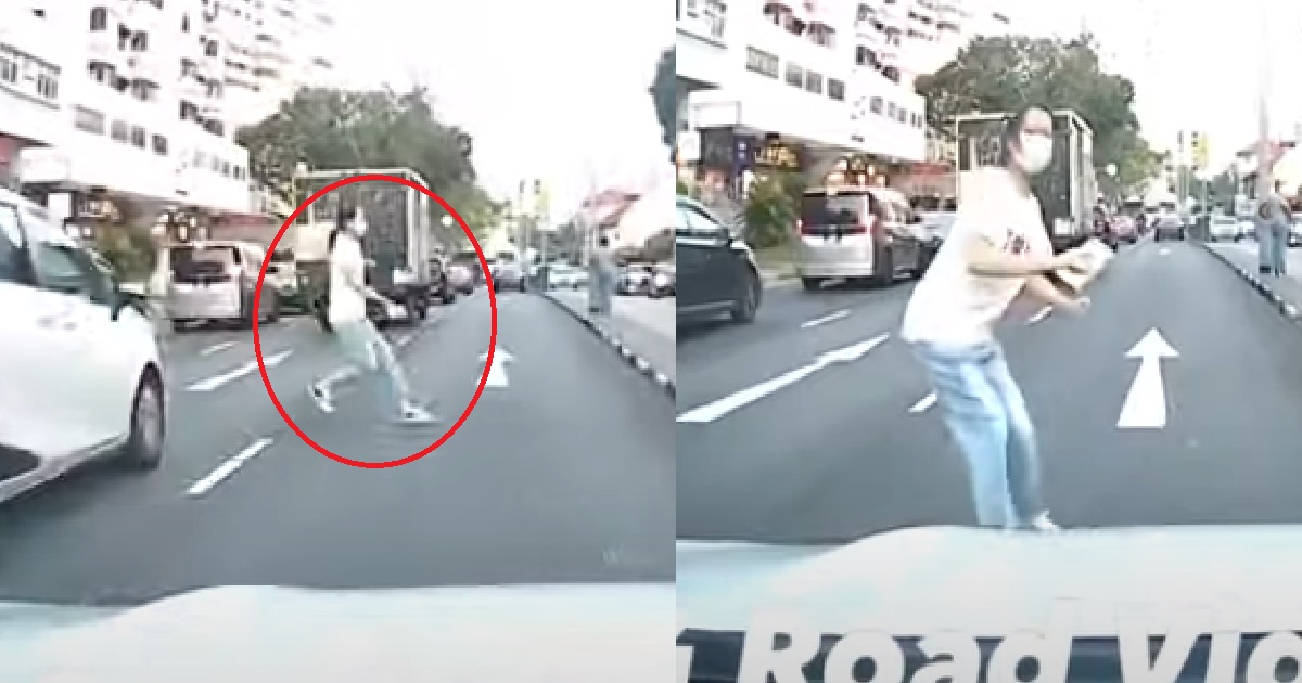 WOMAN DASHES ACROSS THE ROAD WITHOUT LOOKING FOR TRAFFIC, ALMOST SENT TO HEAVEN