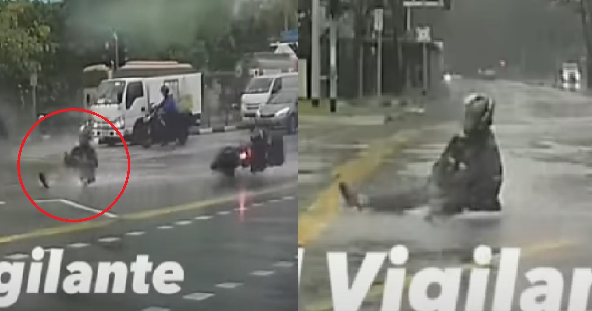 MOTORCYCLIST CRASHED ON WET ROAD AND SLIDES 25 METRES ON HIS BACKSIDE @ JURONG