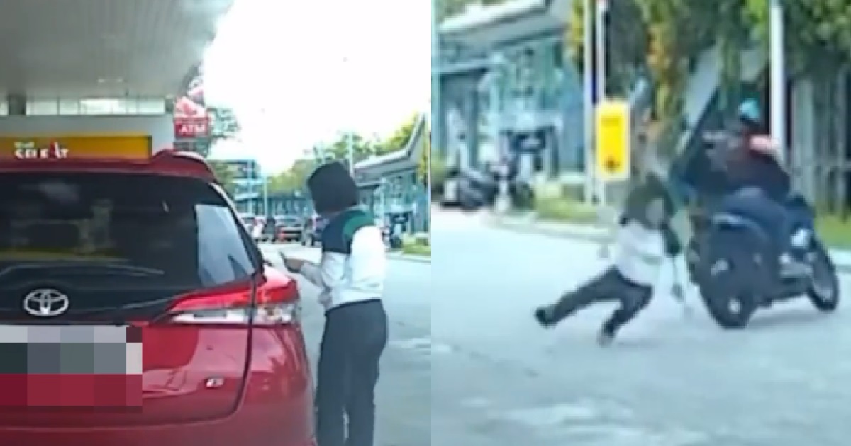 WOMAN PUMPING PETROL, ROBBED BY MAN WHO SNEAKILY OPENED HER CAR DOOR ON OTHER SIDE
