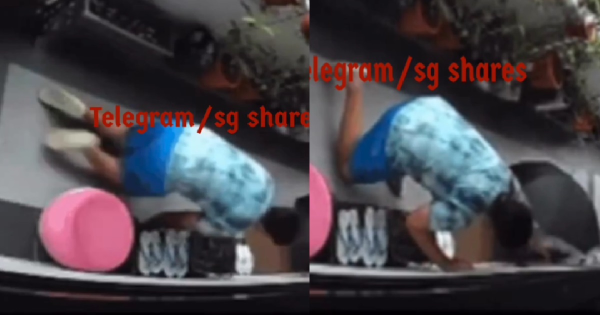 GUY CRAWLS ON THE FLOOR OUTSIDE RESIDENT’S HDB UNIT & STEALS THEIR UMBRELLA