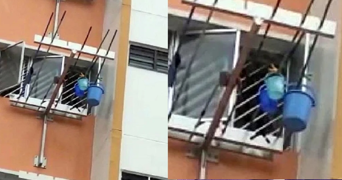 OLD WOMAN HANGS BUCKET OUTSIDE 10TH FLOOR WINDOW TO COLLECT RAINWATER TO SAVE MONEY