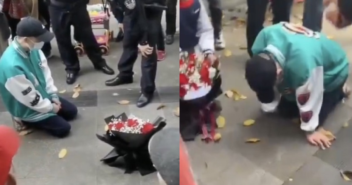 MAN KNEELS DOWN IN RAIN OUTSIDE EX-GF’S WORKPLACE TO WIN HER BACK, ULTIMATE SIMP