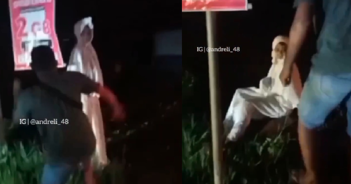 PRANKSTER DRESSED AS POCONG, BEATEN UP & DRAGGED TO POLICE STATION BY ANGRY RESIDENTS