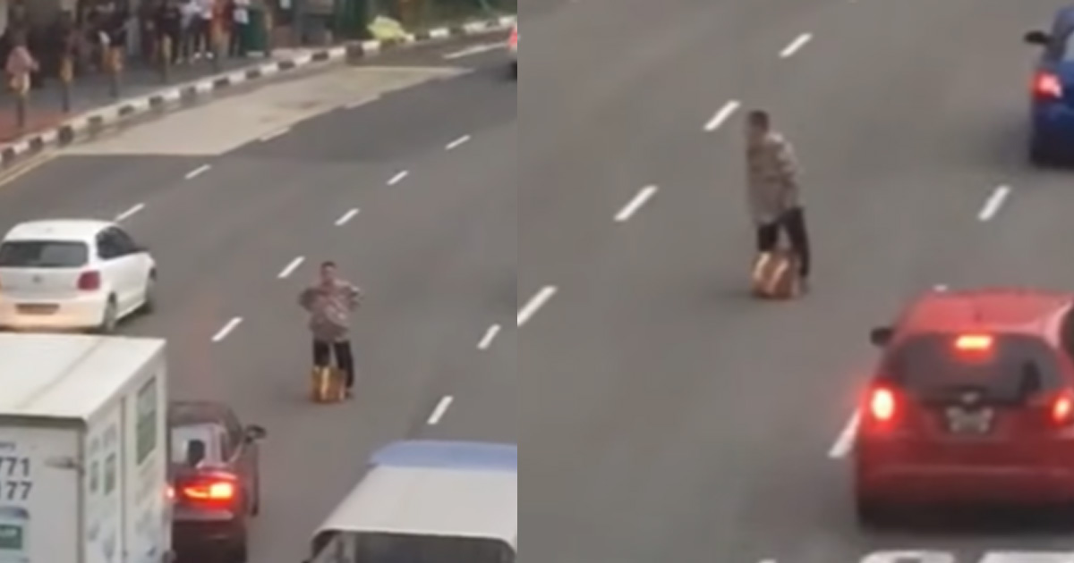 MAN STANDING IN THE MIDDLE OF UPPER CROSS STREET, REFUSED TO MOVE