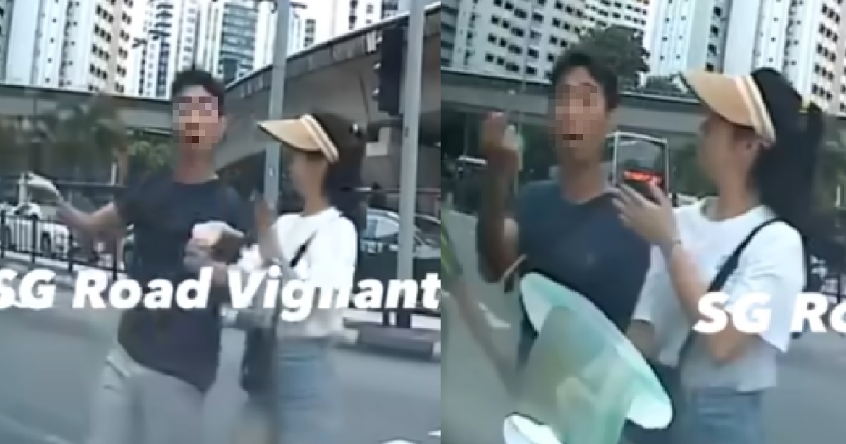 MAN DASHED ACROSS ROAD AFTER TRAFFIC LIGHT TURNED RED, POINT MIDDLE FINGER AT DRIVER