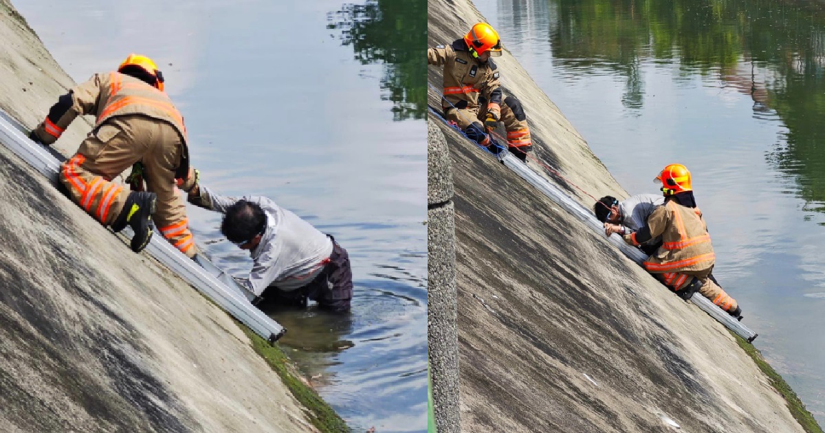 MAN FELL INTO LONGKANG @ TELOK KURAU, RESCUED BY SCDF OFFICERS USING A LADDER