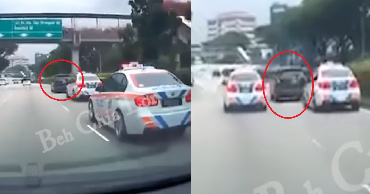GOONDU DRIVER HOGGING LANE RIGHT IN FRONT OF 2 POLICE CARS, REFUSE TO LET THEM PASS